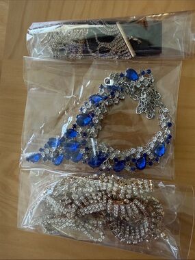 Fun costume jewelry, two necklaces and a bracelet!